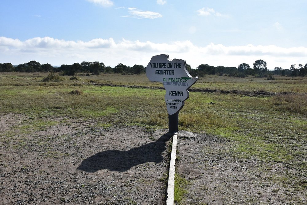 Equator sign Ol Pejeta Conservancy Kenya latitude 0 degrees